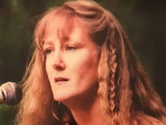 Julie Monroe has been involved in the local music scene for many years, singing and playing acoustic guitar.