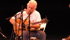 Rich grew up in Fort Lee, N.J. He believes he may be the only person in his home town who can yodel. He says he wore out a lot of records and a few turntables listening and learning anything from Bill Monroe to the Allman Brothers. He has played blues, country, folk, and rock in no particular order as a solo and in both acoustic and electric bands. He studied classical guitar and composition, and worked for five years as a jingle writer in Chicago, writing music for Cap'n Crunch Cereal, Gatorade, and Domino's Pizza, among others. He has gained a reputation as a songwriter and as a "guitar whiz" for his multi-styled approach to the instrument (a label he says he'll only accept when the endorsements start rolling in) and has participated in workshops with players like Steve Kaufmann and Pat Kirtley, and Stephen Bennett.
