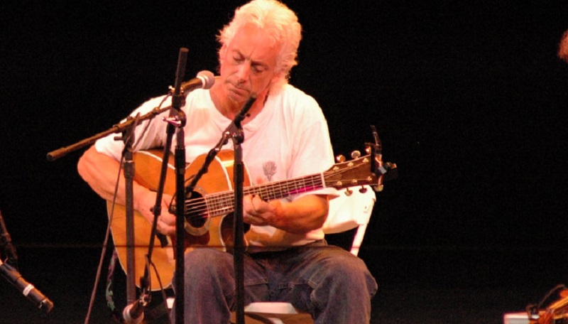 Rich grew up in Fort Lee, N.J. He believes he may be the only person in his home town who can yodel. He says he wore out a lot of records and a few turntables listening and learning anything from Bill Monroe to the Allman Brothers. He has played blues, country, folk, and rock in no particular order as a solo and in both acoustic and electric bands. He studied classical guitar and composition, and worked for five years as a jingle writer in Chicago, writing music for Cap'n Crunch Cereal, Gatorade, and Domino's Pizza, among others. He has gained a reputation as a songwriter and as a "guitar whiz" for his multi-styled approach to the instrument (a label he says he'll only accept when the endorsements start rolling in) and has participated in workshops with players like Steve Kaufmann and Pat Kirtley, and Stephen Bennett.